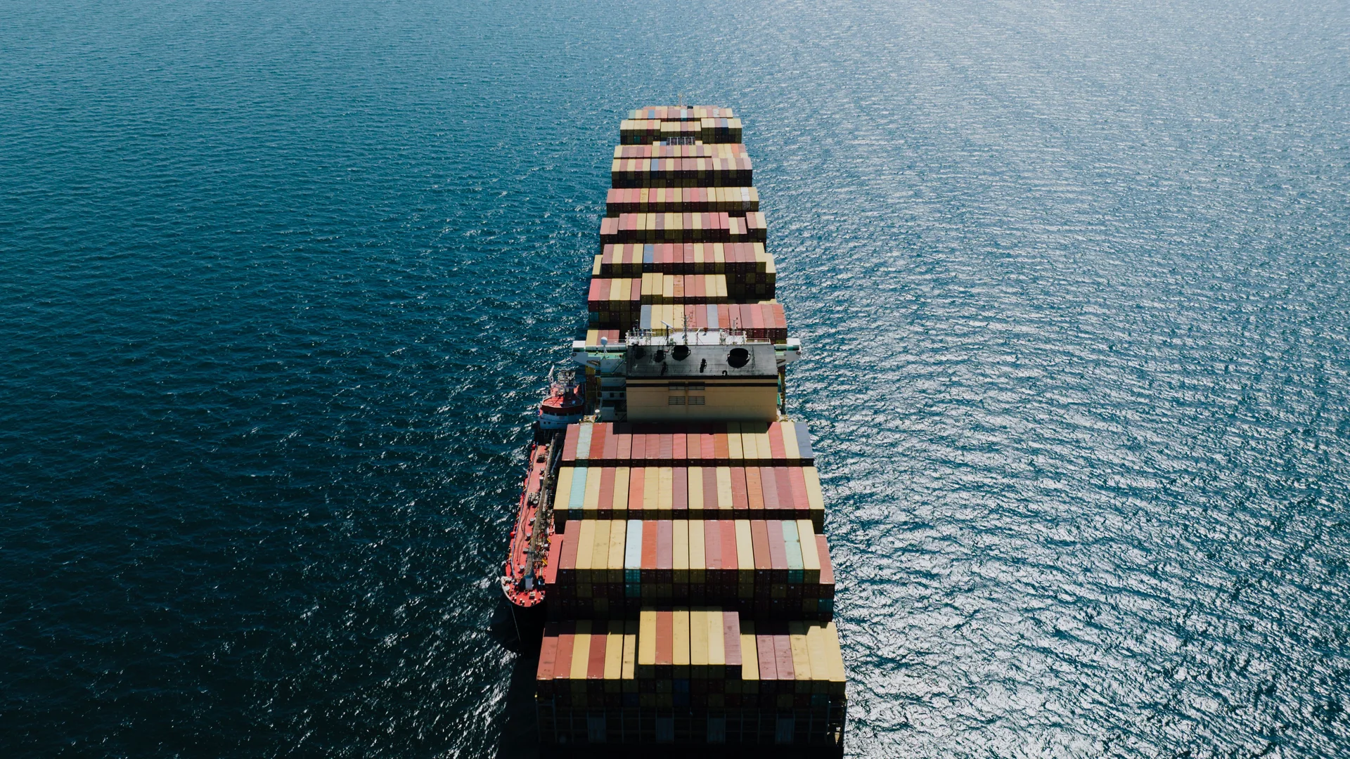 Photograph of a real commercial shipping · container vessel vessel, used for illustration.