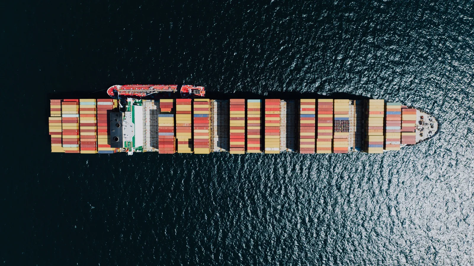 Photograph of a real commercial shipping · container vessel vessel, used for illustration.