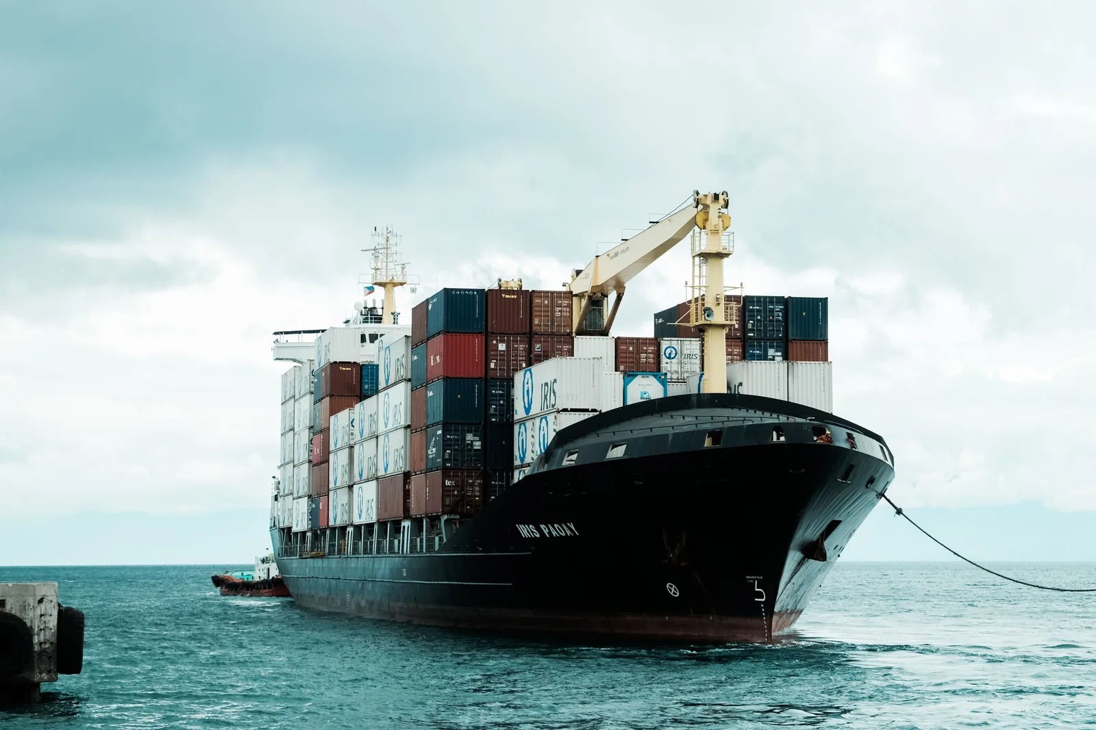 Photograph of a real commercial shipping · container vessel vessel, used for illustration.